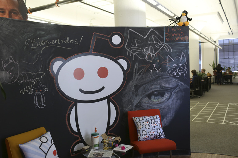 A Reddit mascot is shown at the company's headquarters in San Francisco, California April 15, 2014. Reddit, a website with a retro-'90s look and space-alien mascot that tracks everything from online news to celebrity Q&As, is going after more eyeballs, and advertising, by allowing members of its passionate community to post their own news more quickly and easily. REUTERS/Robert Galbraith  (UNITED STATES - Tags: BUSINESS SCIENCE TECHNOLOGY)