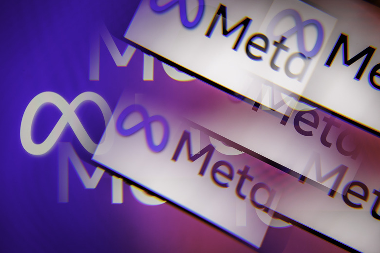 ANKARA, TURKIYE - DECEMBER 07: In this photo illustration, Meta logo is being displayed on a mobile phone screen in front of computer screen with the logo of Meta in Ankara, Turkiye on December 07, 2023. (Photo by Ahmet Serdar Eser/Anadolu via Getty Images)