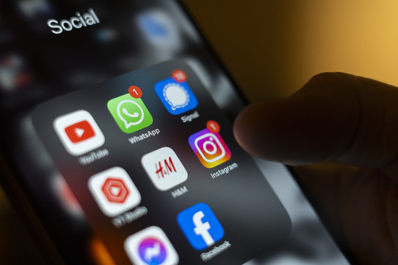 Social media applications are seen on an iPhone in this photo illustration taken on 10 November, 2023 in Warsaw, Poland. (Photo by Jaap Arriens/NurPhoto via Getty Images)