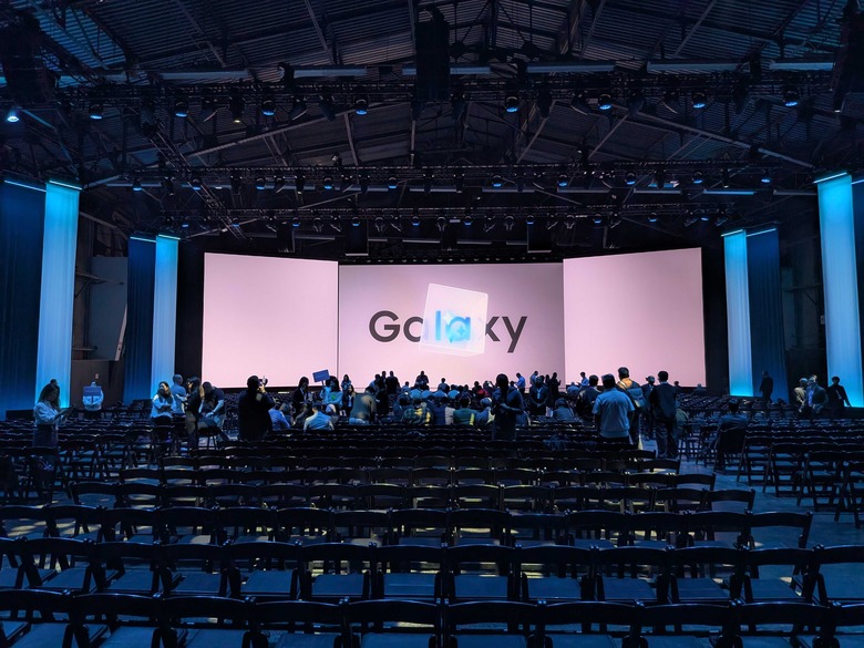 The stage at Galaxy Unpacked 2026 with rows of seats in front of it.