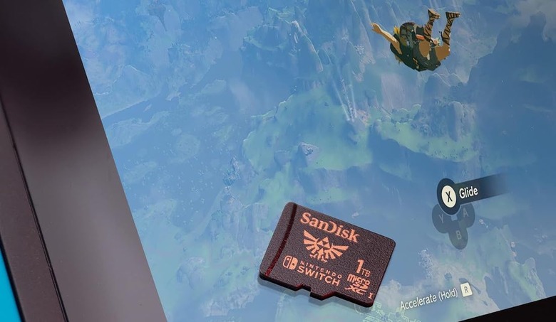 A SanDisk microSB sits on a gaming screen.