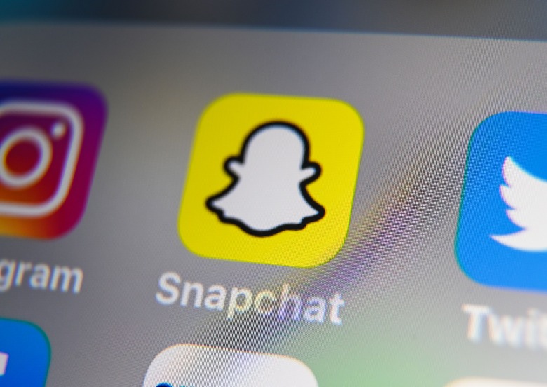A picture taken on October 1, 2019 in Lille shows the logo of mobile app Snapchat displayed on a tablet. (Photo by DENIS CHARLET / AFP) (Photo by DENIS CHARLET/AFP via Getty Images)