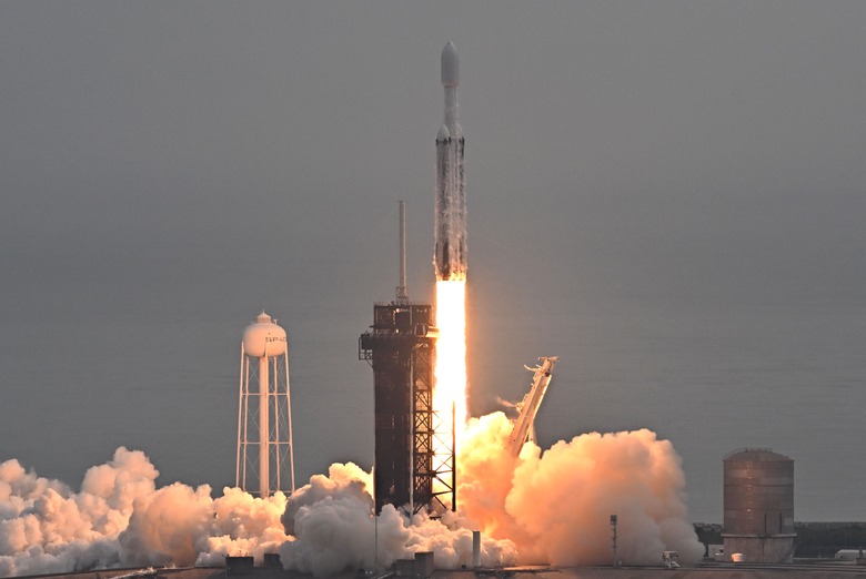 TOPSHOT - A SpaceX Falcon Heavy rocket with the Psyche spacecraft launches from NASA's Kennedy Space Center in Cape Canaveral, Florida, on October 13, 2023. The spacecraft is bound for Psyche, an object 2.2 billion miles (3.5 billion kilometers) away that could offer clues about the interior of planets like Earth. (Photo by CHANDAN KHANNA / AFP) (Photo by CHANDAN KHANNA/AFP via Getty Images)