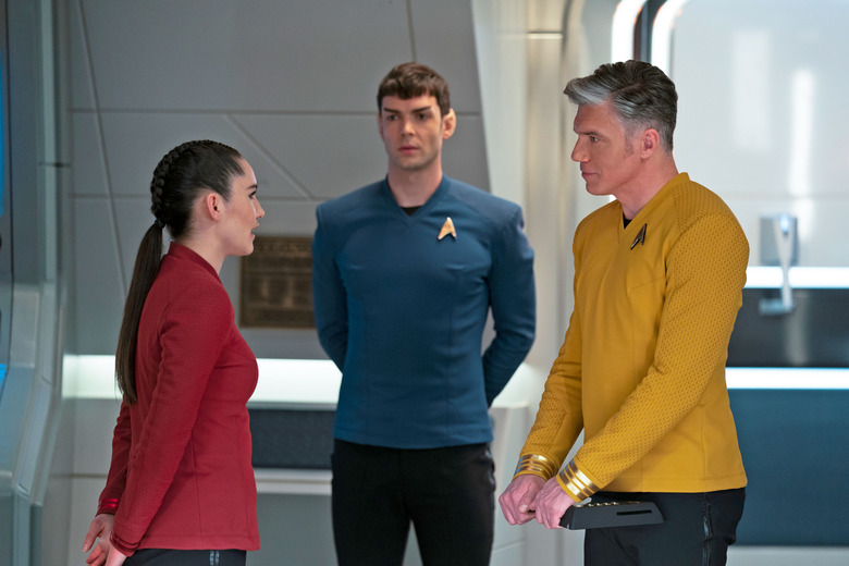 Christina Chong as La'an, Ethan Peck as Spock, and Anson Mount as Pike of the Paramount+ original series STAR TREK: STRANGE NEW WORLDS. 
