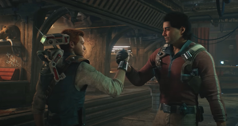 Two dudes shaking hands.