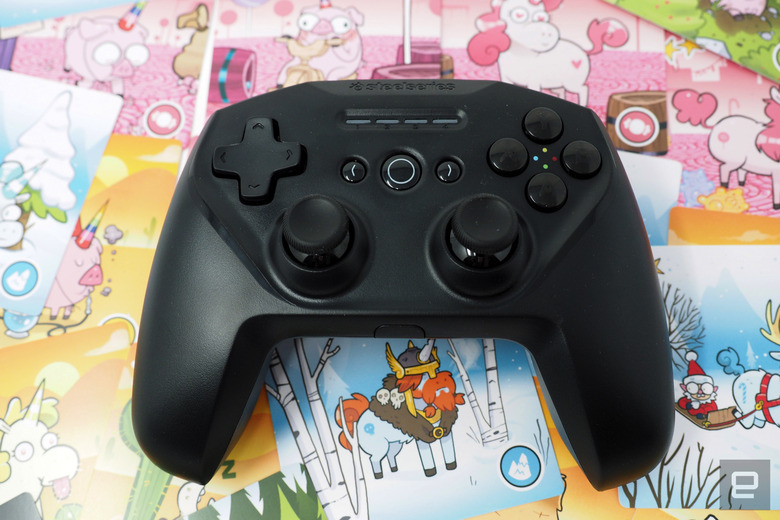 SteelSeries Nimbus+ in black on a field of pastels