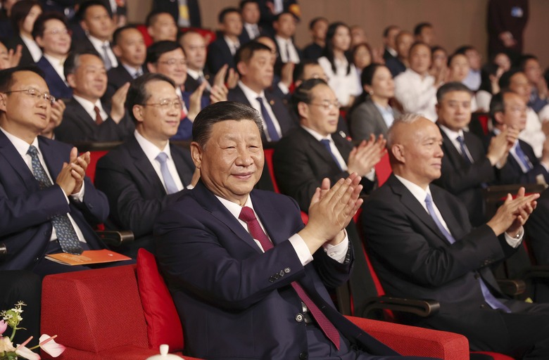 Chinese President Xi Jinping applauds as he attends a concert marking the 75th anniversary of the establishment of diplomatic relations between Russia and China and opening of China-Russia Years of Culture at the National Centre for the Performing Arts in Beijing, China, on Thursday, May 16, 2024. (Alexander Ryumin, Sputnik, Kremlin Pool Photo via AP)
