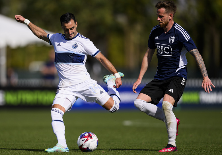 Feb 12, 2023; Indio, CA, USA; Vancouver Whitecaps defender Javain Brown (23) shoots the ball against St. Louis City SC at Empire Polo Club. Mandatory Credit: Kelvin Kuo-USA TODAY Sports