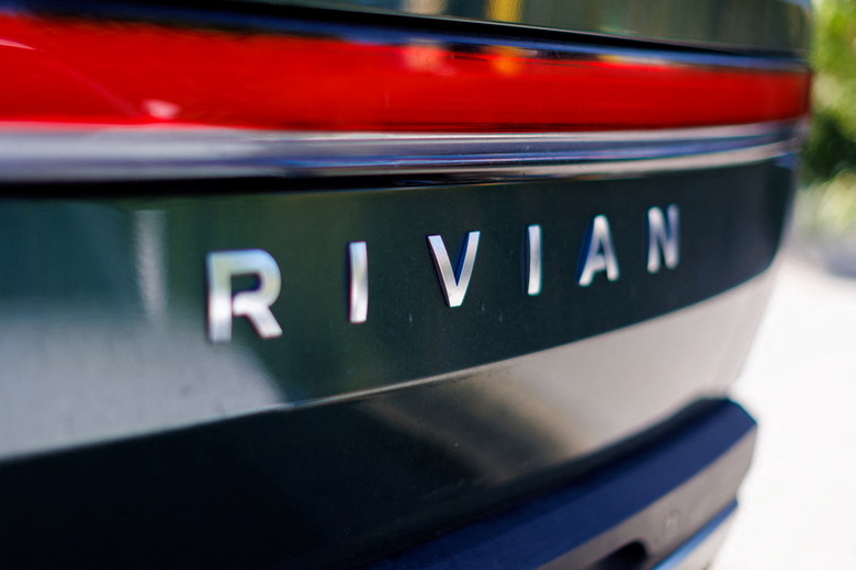 An electric pick-up truck is pictured at the Rivian Automotive Inc facility in Costa Mesa, California, U.S.,November 1, 2023.     REUTERS/Mike Blake