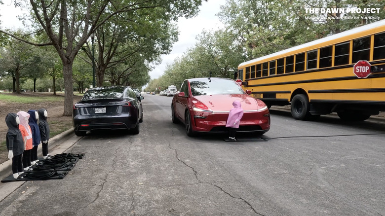 A Tesla Model Y running over a child-sized mannequin as demonstrated by The Dawn Project.