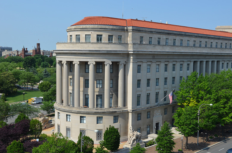 A building with trees and the sky in the background.