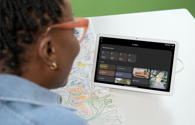 A tablet on a white table.