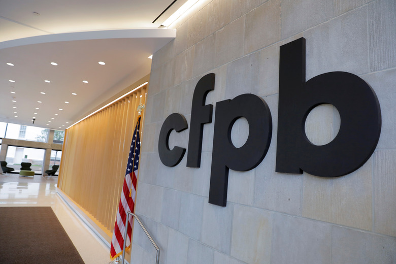 FILE PHOTO: Signage is seen at the Consumer Financial Protection Bureau (CFPB) headquarters in Washington, D.C., U.S., May 14, 2021. REUTERS/Andrew Kelly/File Photo