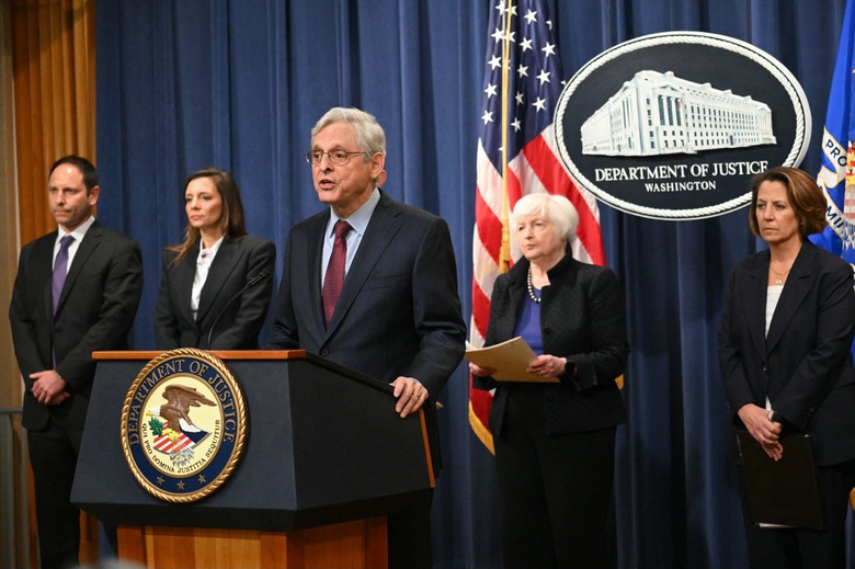 US Attorney General Merrick Garland speaks at a press conference with Treasury Secretary Janet Yellen (2nd R) and US Deputy Attorney General Lisa Monaco (R) to announce cryptocurrency enforcement actions at the Justice Department in Washington, DC, on November 21, 2023. (Photo by Mandel NGAN / AFP) (Photo by MANDEL NGAN/AFP via Getty Images)