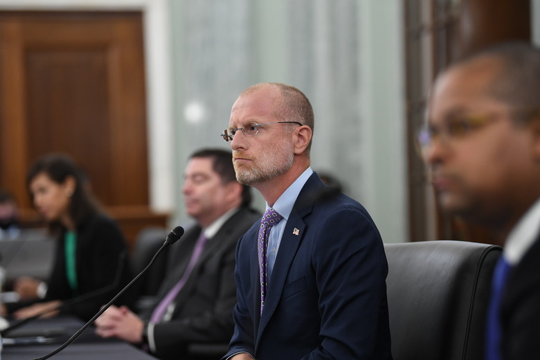 FILE - Brendan Carr listens during a Senate Commerce, Science, and Transportation committee hearing to examine the Federal Communications Commission on Capitol Hill in Washington, June 24, 2020. (Jonathan Newton/The Washington Post via AP, File)