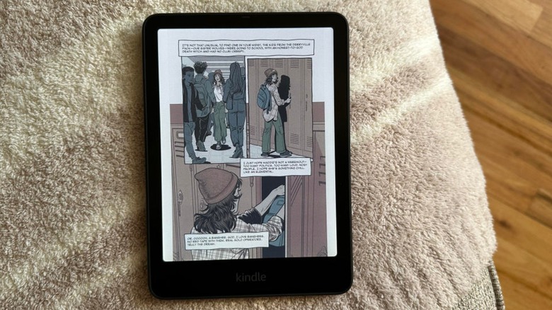 The Kindle Colorsoft sitting on a blanket, displaying a comic.