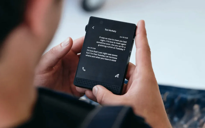 Someone using a phone.