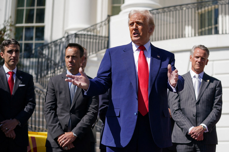 U.S. President Donald Trump speaks during an event with the racing champions from NASCAR Cup Series, NTT IndyCar Series, and IMSA WeatherTech SportsCar Championship, at the White House in Washington, D.C., U.S., April 9, 2025.  REUTERS/Nathan Howard
