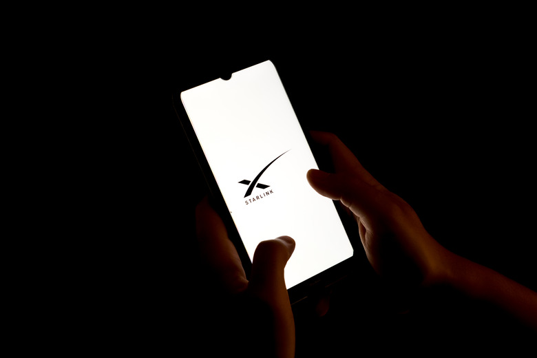 In this photo illustration a Starlink logo seen displayed on a smartphone screen in Chania, Greece on August 15, 2023. (Photo illustration by Nikolas Kokovlis/NurPhoto via Getty Images)