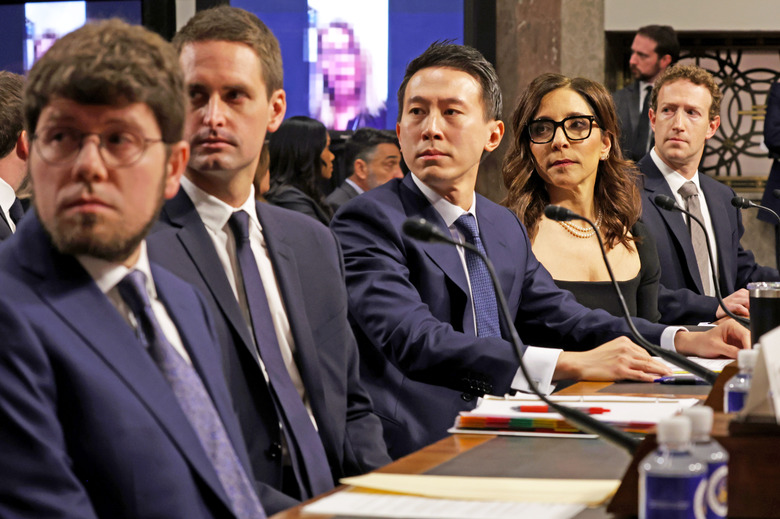 WASHINGTON, DC - JANUARY 31: (L-R) Jason Citron, CEO of Discord, Evan Spiegel, CEO of Snap, Shou Zi Chew, CEO of TikTok, Linda Yaccarino, CEO of X, and Mark Zuckerberg, CEO of Meta look on as they testify before the Senate Judiciary Committee at the Dirksen Senate Office Building on January 31, 2024 in Washington, DC. The committee heard testimony from the heads of the largest tech firms on the dangers of child sexual exploitation on social media. 