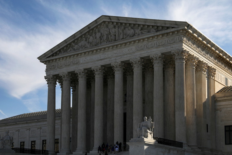 People visit the U.S. Supreme Court building in Washington, U.S. March 15, 2022. REUTERS/Emily Elconin
