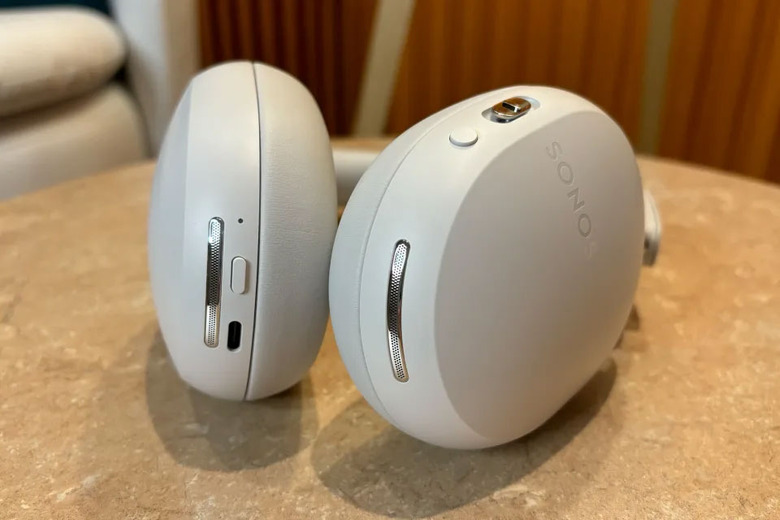 Image of a cream pair of Sonos Ace on a table