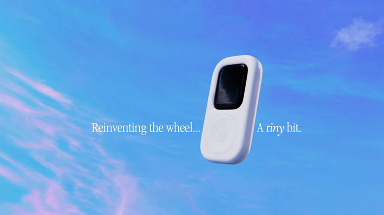 Marketing image for the tinyPod. The product, which looks like an iPod with click wheel, floats in front of a blue sky. Text: 
