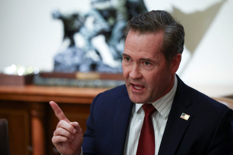 U.S. National Security Advisor Mike Waltz gestures on the day U.S. President Donald Trump (not pictured) delivers remarks at the White House in Washington, D.C., U.S., March 25, 2025. REUTERS/Evelyn Hockstein/File Photo