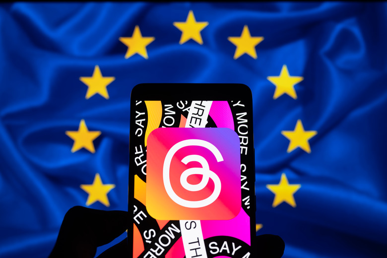The Meta - Threads logo is being displayed on a smartphone with the European Union flag in the background, in this photo illustration, in Brussels, Belgium, on December 2, 2023. (Photo illustration by Jonathan Raa/NurPhoto via Getty Images)