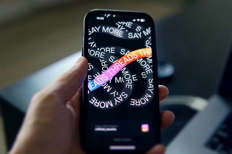 Threads logo on a phone.