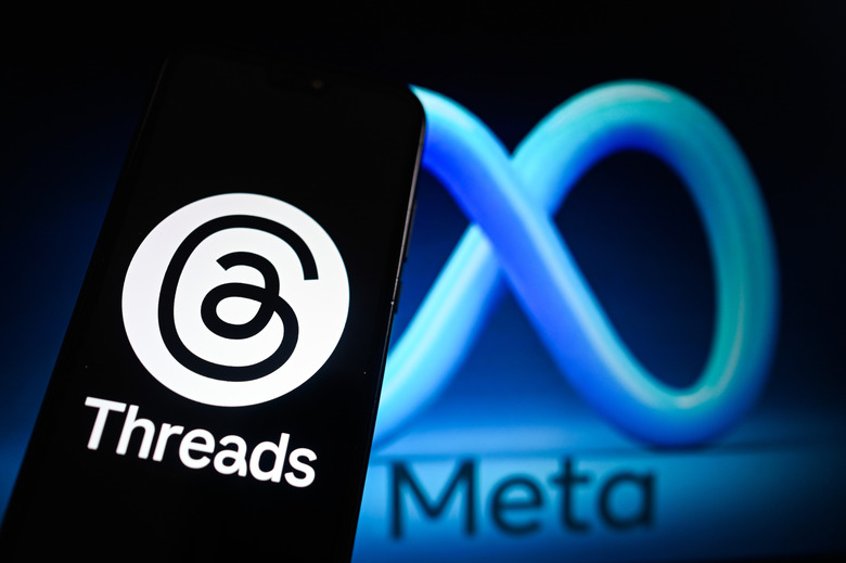 POLAND - 2024/04/16: In this photo illustration, a Threads logo is displayed on a smartphone with a META symbol in the background. (Photo Illustration by Omar Marques/SOPA Images/LightRocket via Getty Images)