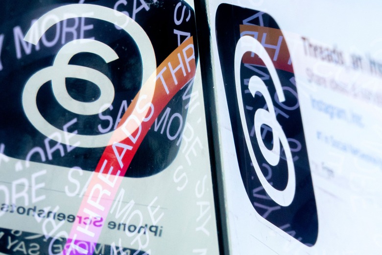 This photo illustration created  in Washington, DC, on July 6, 2023, shows the logo for Threads, an Instagram app, next to its page on the App Store. More than 10 million people have signed up to Threads, Meta's rival to Twitter, within the first few hours of its launch, the company's CEO Mark Zuckerberg said July 6. The app went live on Apple and Android app stores in 100 countries at 2300 GMT on July 5, 2023, and will run with no ads for now, but its release in Europe has been delayed over data privacy concerns. (Photo by Stefani Reynolds / AFP) (Photo by STEFANI REYNOLDS/AFP via Getty Images)