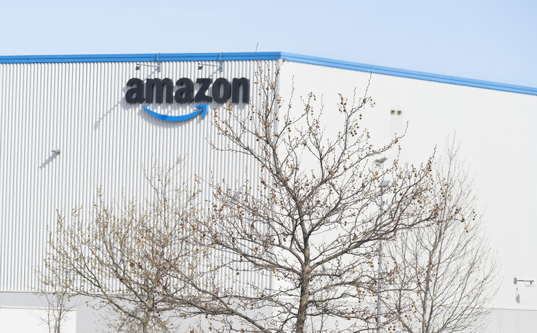 MADRID, SPAIN - 2026/03/31: Logo of Amazon, the American e-commerce and cloud computing company, is seen at a logistics and shipping hub in Madrid. (Photo by Xavi Lopez/SOPA Images/LightRocket via Getty Images)