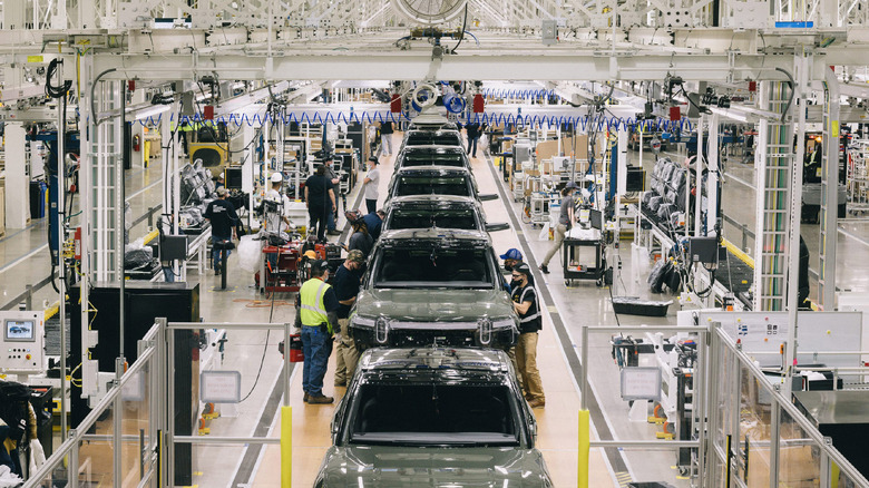 A photograph of the Rivian factory producing the company's R1 SUV variant.