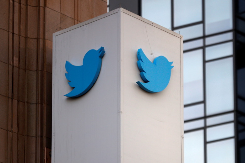 A Twitter logo is seen outside the company headquarters, during a purported demonstration by supporters of U.S. President Donald Trump to protest the social media company's permanent suspension of the President's Twitter account, in San Francisco, California, U.S., January 11, 2021. REUTERS/Stephen Lam