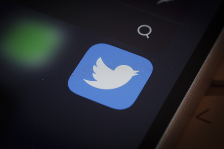 The Twitter logo is seen on an iPhone mobile device in this illustration photo in Warsaw, Poland on 12 October, 2022. (Photo by STR/NurPhoto via Getty Images)