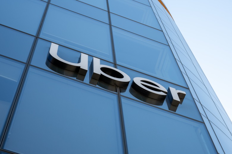 Facade of Uber headquarters with logo prominently displayed on glass building, San Francisco, California, August 20, 2024. (Photo by Smith Collection/Gado/Getty Images)