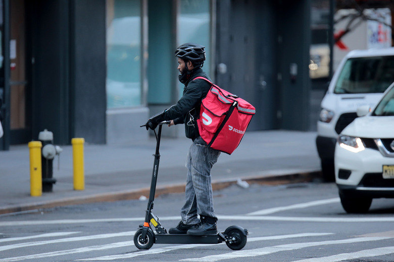 A food delivery messenger is seen in Manhattan. (Luiz C. Ribeiro/New York Daily News/Tribune News Service via Getty Images)