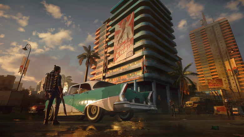 Far Cry 6 protagonist Dani Rojas in front of a tall building.