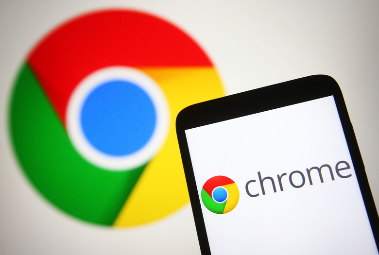 UKRAINE - 2021/07/19: In this photo illustration a Google Chrome logo of a web browser developed by Google is seen on a smartphone and a pc screen. (Photo Illustration by Pavlo Gonchar/SOPA Images/LightRocket via Getty Images)