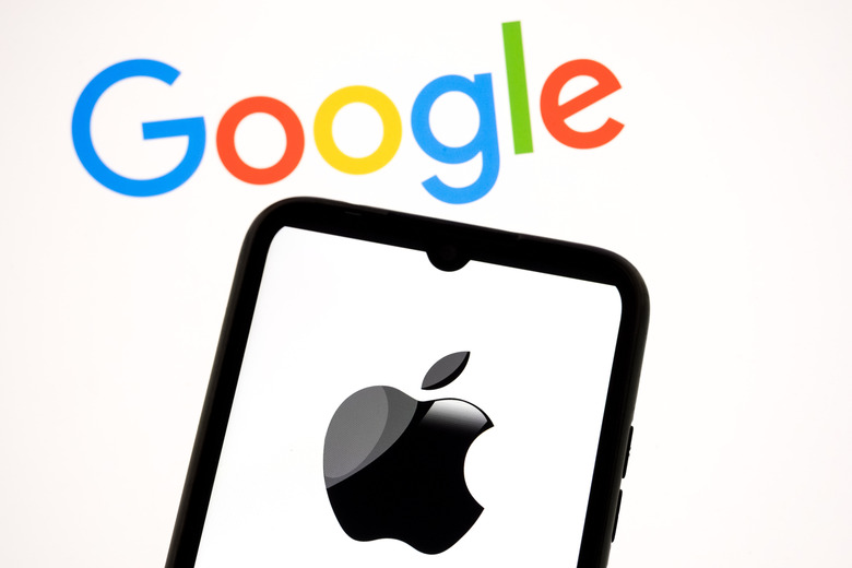 The Apple logo appears on a smartphone screen, and the Google logo displays as the background on a laptop computer screen in this photo illustration in Athens, Greece, on January 13, 2026. Apple and Google announce a multi-year strategic partnership under which Apple integrates Google's advanced Gemini AI models to power its upcoming Apple Intelligence features, including a major overhaul of the Siri voice assistant. The deal marks a rare collaboration between two longtime rivals in artificial intelligence and mobile technology. (Photo by Nikolas Kokovlis/NurPhoto via Getty Images)