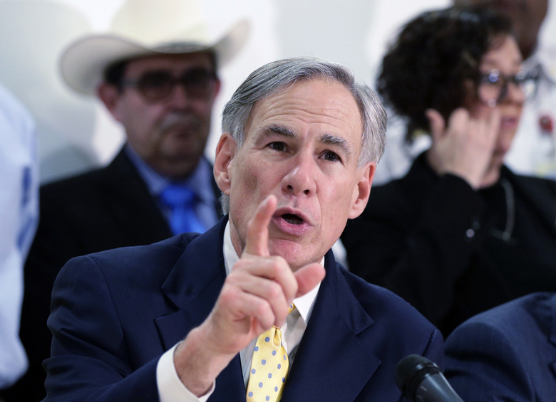 FILE - In this March 16, 2020, file photo, Texas Gov. Greg Abbott speaks during a news conference in San Antonio. Gov. Abbott, in defending Texas' near-ban on abortions, says women and girls who are raped won't be forced to give birth because the new law 