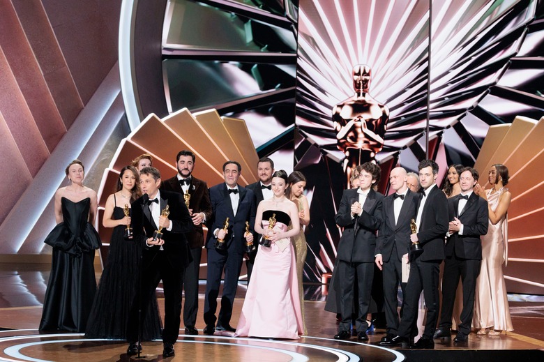 The cast and crew of Anora accepting the award for Best Picture at the 97th Oscars.