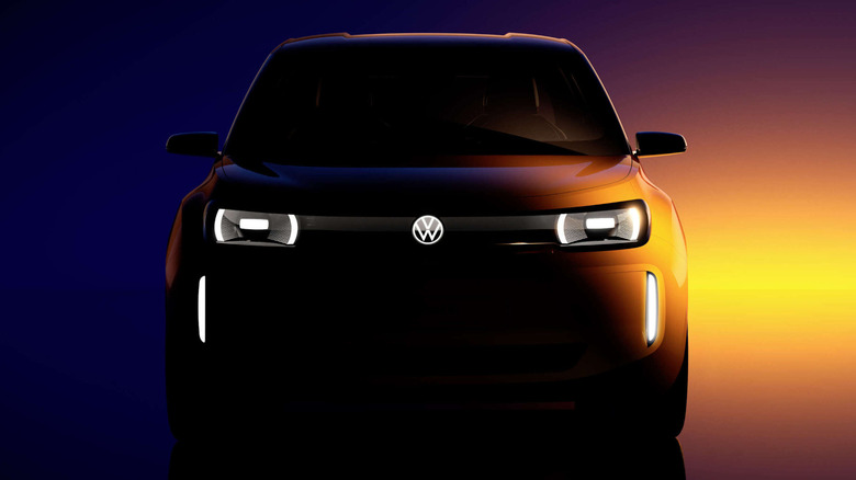 The silhouette of a vehicle with the Volkswagen logo.