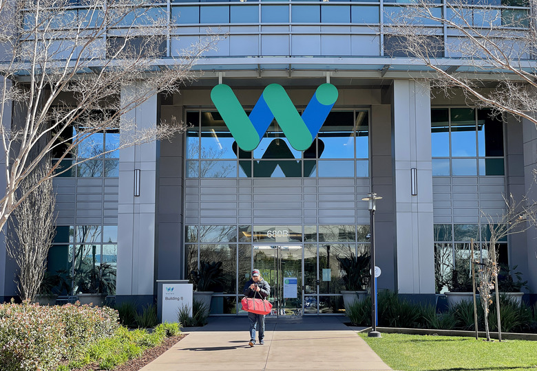 MOUNTAIN VIEW, CALIFORNIA - MARCH 01: A sign is posted on the exterior of a Waymo office on March 01, 2023 in Mountain View, California. Waymo, Alphabet's self-driving car division, announced that it has laid off over 135 employees in a second round of layoffs this year. Waymo has cut 8 percent of its workforce this year. (Photo by Justin Sullivan/Getty Images)