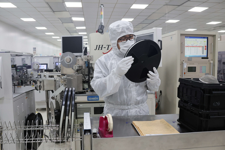 YANGXIN, CHINA - NOVEMBER 24 2024: A man works at a chipmaker of automobile semiconductors in Yangxin county in east China's Shandong province Sunday, Nov. 24, 2024. (Photo credit should read CHU BAORUI / Feature China/Future Publishing via Getty Images)