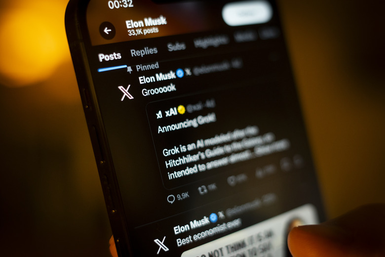 The X app, formerly known as Twitter is seen while a user scrolls through his feed in this photo illustration taken on 10 November, 2023 in Warsaw, Poland. (Photo by Jaap Arriens/NurPhoto via Getty Images)