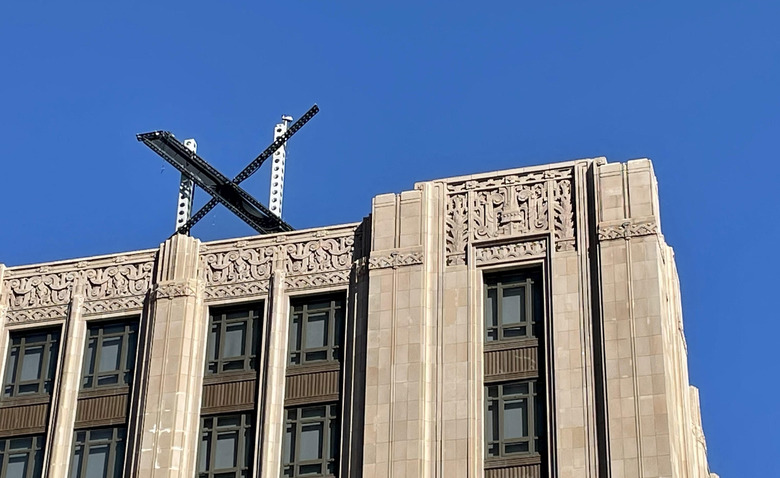 The new X sign is installed on the roof of the headquarters of Twitter, which is being rebranded as 