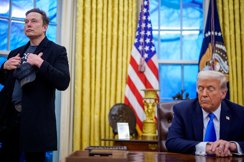 WASHINGTON, DC - FEBRUARY 11: Tesla and SpaceX CEO Elon Musk and U.S. President Donald Trump appear during an executive order signing in the Oval Office at the White House on February 11, 2025 in Washington, DC. Trump is to sign an executive order implementing the Department of Government Efficiency's (DOGE) 