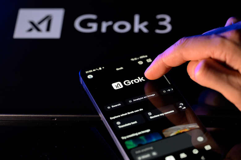 The Grok X AI app displays on a mobile phone with the Grok X AI logo, as seen in this photo illustration in Brussels, Belgium, on February 16, 2025. (Photo by Jonathan Raa/NurPhoto via Getty Images)